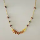 Collier feuillage noir, rouge et doré