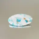 Broche turquoise claire et blanche