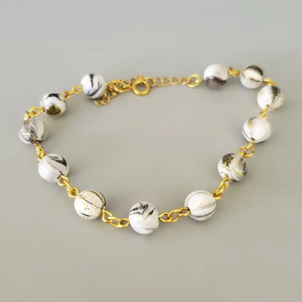 [BRA001] Bracelet blanc et noir