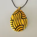 Collier goutte noir doré